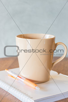 Cup of coffee on simply work table
