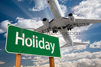Holiday Green Road Sign and Airplane Above