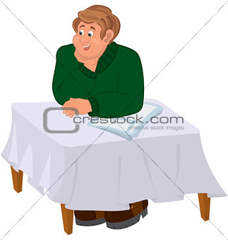 Happy cartoon man sitting at the table