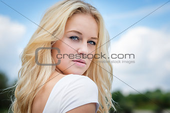 Blond girl outdoor portrait