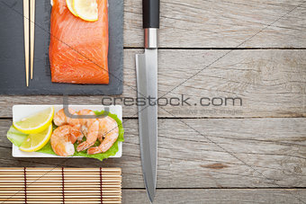 Fresh sea food and kitchen utensils