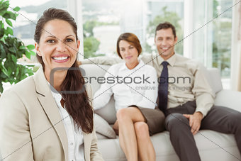 Couple in meeting with a female financial adviser