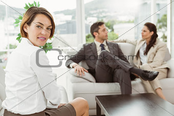 Couple in meeting with financial adviser at home