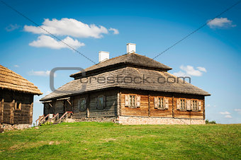Beautiful restored old style russian farmhouse with thatch roof