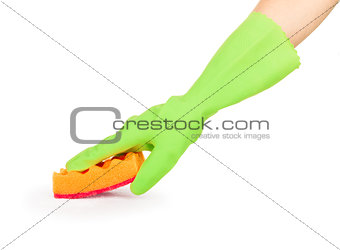 Hand in rubber glove holding washing up sponges on white backgro