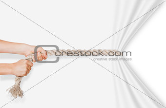 hands pulling rope on a white background