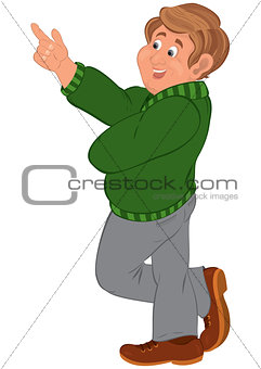 Happy cartoon man standing in green sweater and brown shoes