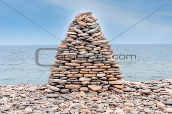Pile of stone ashore