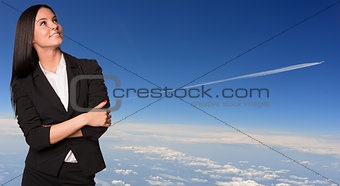 Businesswoman smiling and looking up