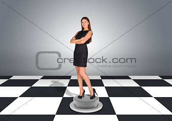 Beautiful businesswoman standing with crossed arms