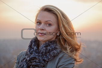 Young girl blonde on simple background