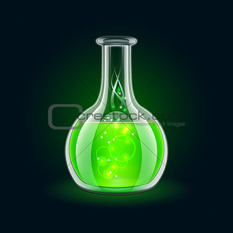 Transparent flask with magic green liquid on black background.
