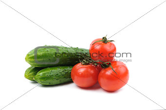 tomatoes and cucumbers vegetables isolated on a white background