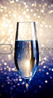 one flute of champagne on abstract background