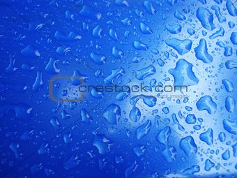water rain drop in blue background