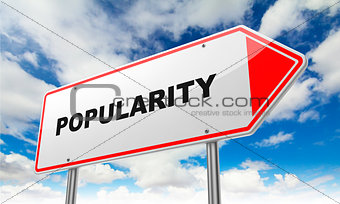 Popularity on Red Road Sign.