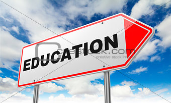 Education on Red Road Sign.