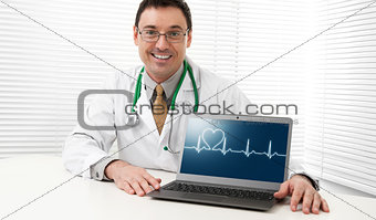 Doctor with laptop computer