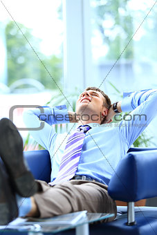 businessman relaxing in his office