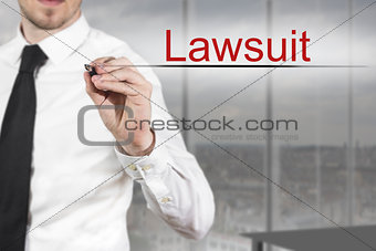businessman writing in the air lawsuit