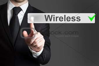 businessman pushing flat touchscreen button wireless
