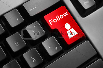 dark grey keyboard red button follow