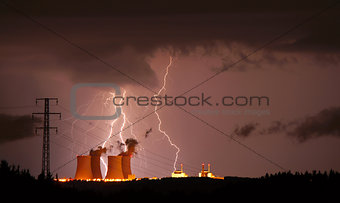 Lightning storm over a nuclear power plant.
