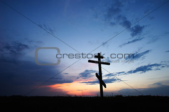 cross silhouette with the sunset