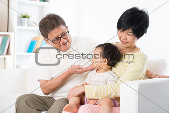 Asian family portrait at home