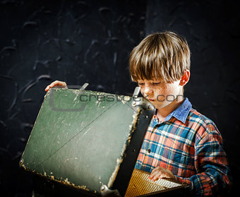 Little boy finding treasure