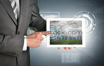 Man hands using tablet. Virtual elements and city on touchscreen