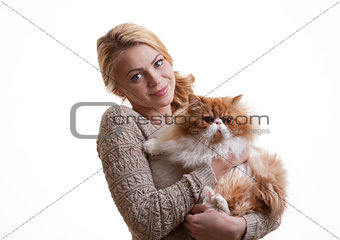 The nice girl with a red cat on hands