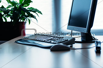 Computer on desk in office