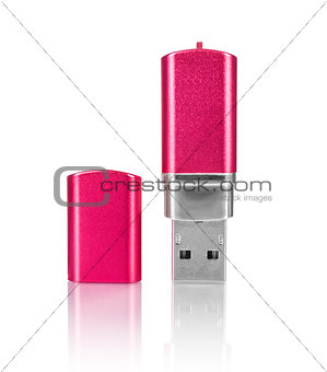pink USB flash with a reflection on isolated white