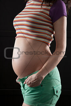 pregnant woman green shorts
