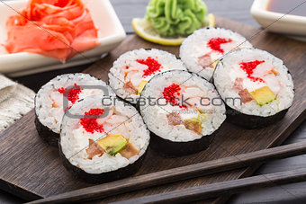 Sushi rolls with tobiko and shrimps