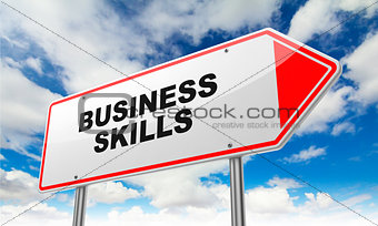 Business Skills on Red Road Sign.