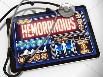 Hemorrhoids on the Display of Medical Tablet.