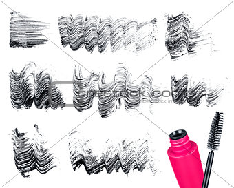 Mascara brush and strokes isolated on white