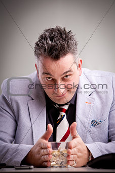 clever businessman with his drink