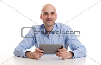 Happy Young Man Using Digital Tablet