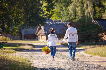 Young couple in Ukrainian style clothing