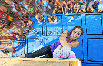 Female climber participating in rock climbing competition
