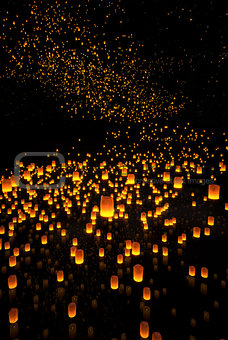 beautiful Lanterns flying on the water and in the night sky