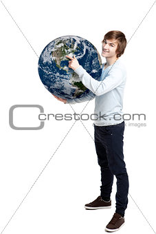 Holding and pointing to a planet earth