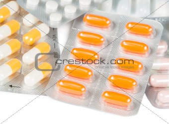 medicine pills and capsules packed in blisters isolated