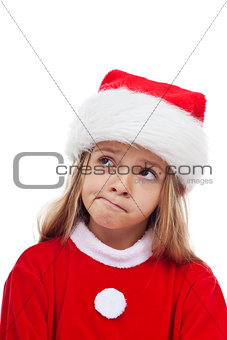 Little girl in santa claus outfit
