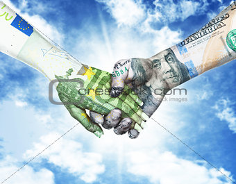 euro and dollar holding hands in sky background
