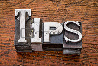 tips word in metal type