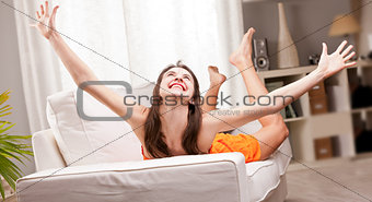 funny posture of a girl embracing her joy